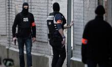 Gunman killed in Brussels raid 'had role in Paris attacks'