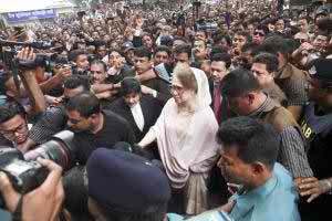 BNP Chairperson Khaleda Zia on her way to court to appear before it in five cases in the capital on Tuesday.