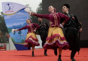 Russian dancers perform a traditional dance during an international tourism fair, the \