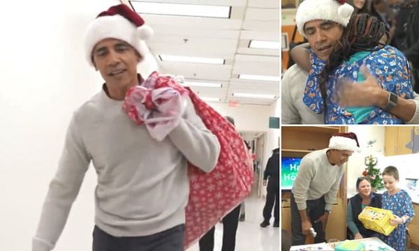 Dressed as Santa Claus, Obama surprises sick children in hospital