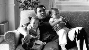 Muhammad Ali is seen cuddling his daughters Laila, (L ) and Hana (R) at a Hotel in London, Britain December 19, 1978.                                      Photo Reuters
