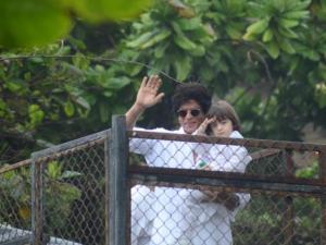 Shah Rukh Khan and his son AbRam greet fans at Mannat, SRK’s house in Mumbai on the occasion of Eid on Thursday.